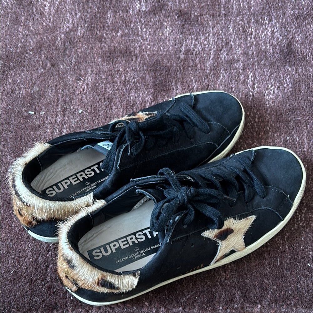 Black super star golden goose sneakers